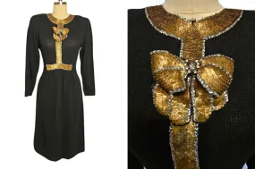 *  VINTAGE LILLIE RUBIN BLACK KNIT EVENINGS DRESS WITH HUGE GOLD AND SILVER SEQUIN BOW ACCENTED WITH SPARKLING RHINESTONES *  VINTAGE LILLIE RUBIN BLACK KNIT EVENINGS DRESS WITH HUGE GOLD AND SILVER SEQUIN BOW ACCENTED WITH SPARKLING RHINESTONES